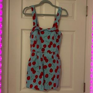 Teal romper with cherries on it 🍒